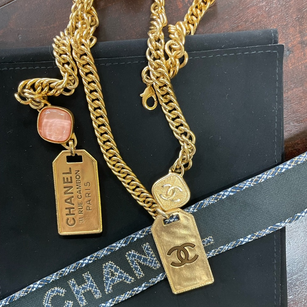 2020 Gold Tone Chanel Lariat Dog Tag necklace.  W/Pink Crystal.